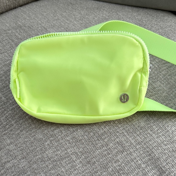 lululemon athletica Handbags - Lululemon Everywhere 1L Belt Bag in the color Electric Lemon